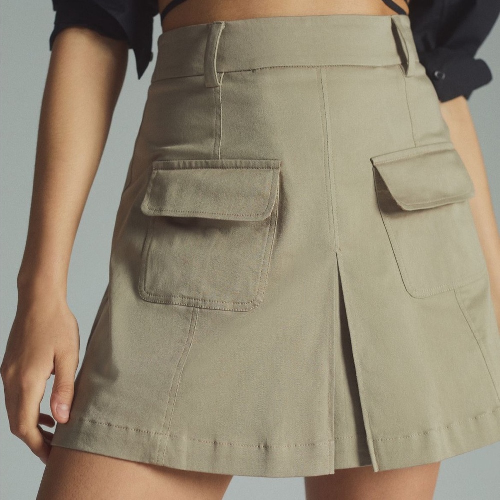 Anthropologie Porridge Utility Pleat Front Mini Skirt in Neutral Olive Green
